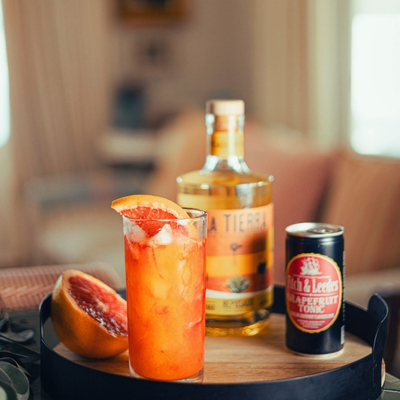 Khoisan Cantarito cocktail made with La Tierra Agave Reposado, citrus juice, soda, and salt rim, a 100% Karoo agave spirit and South African tequila.
