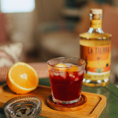 Bushveld Remedy cocktail made with La Tierra Agave Reposado, vermouth, Campari, and bitters, crafted with a 100% Karoo agave spirit.